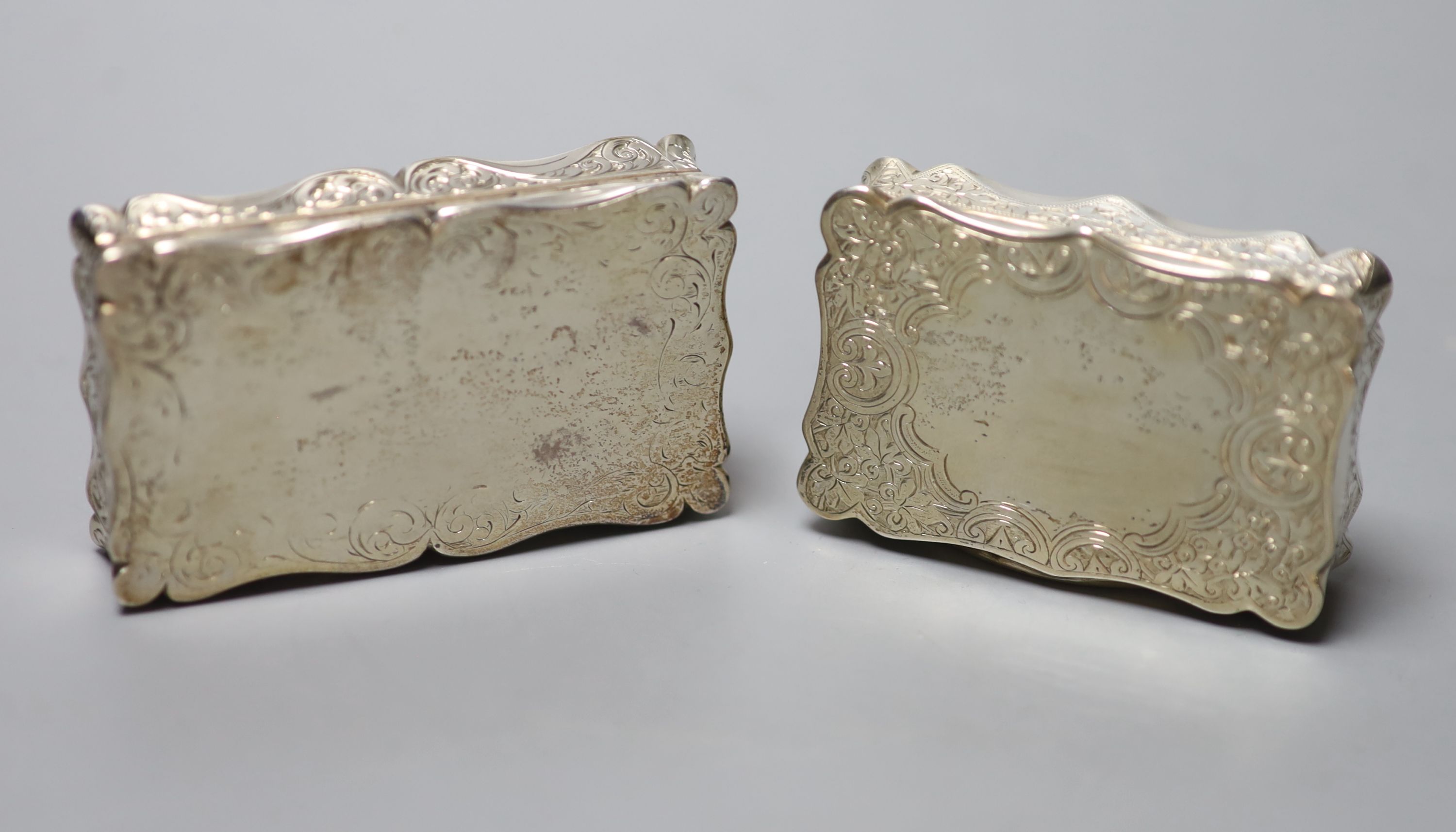 An early Victorian engraved silver snuff box, Edward Smith, Birmingham, 1843, 71mm and one other later silver snuff box.